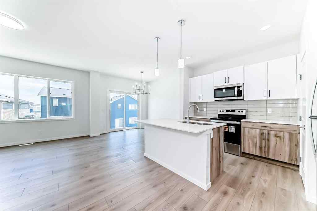MLS® A2236726 - 934 Bayview Heights SW in Bayview Airdrie, Residential