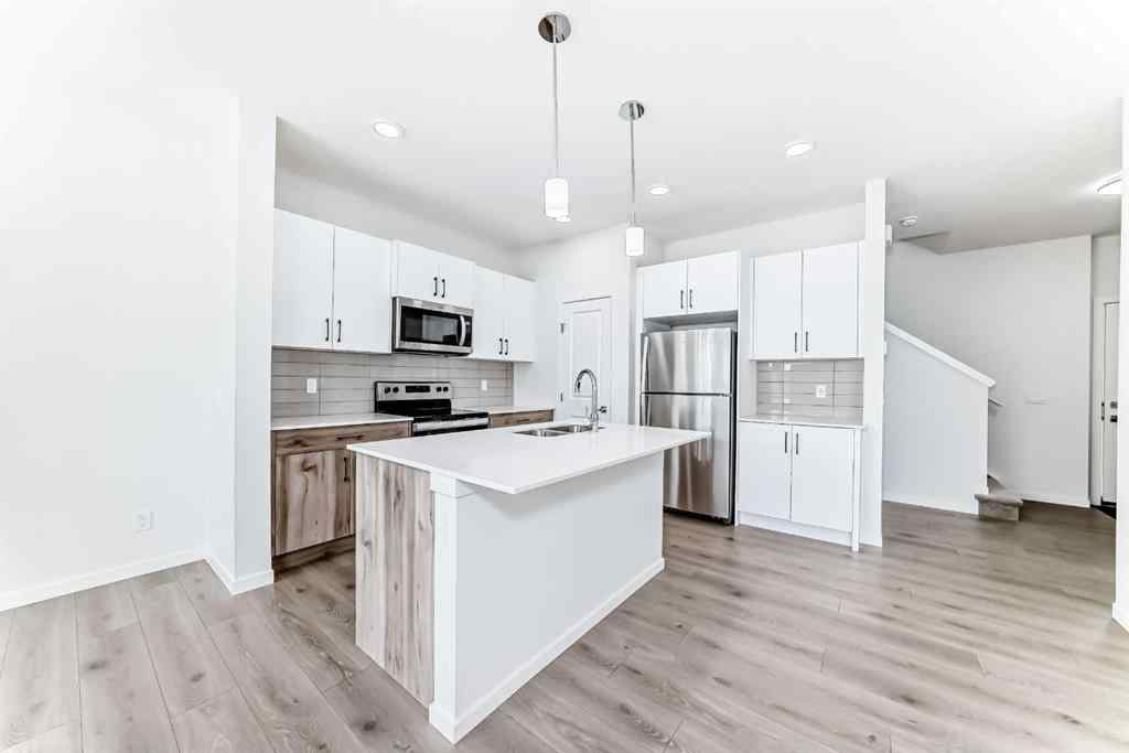 MLS® A2236726 - 934 Bayview Heights SW in Bayview Airdrie, Residential