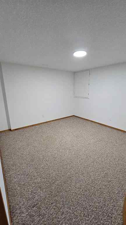 MLS® A2236730 - 207 Centre Avenue NE in NONE Milk River, Residential