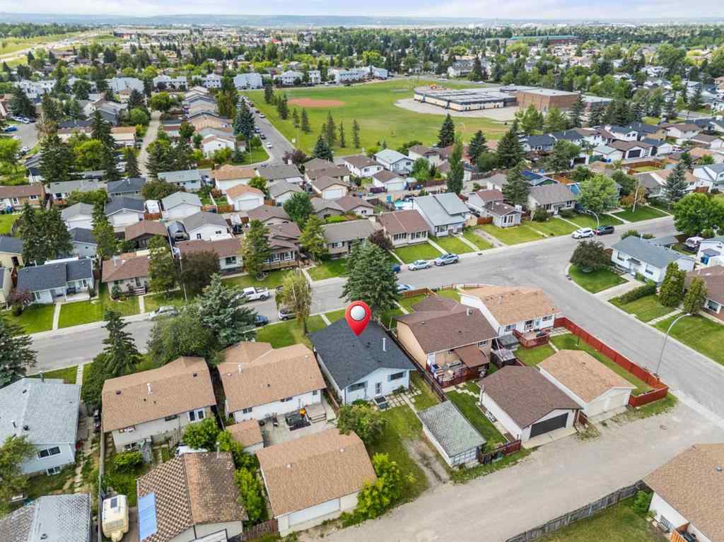 MLS® A2236752 - 67 Fallswater Road NE in Falconridge Calgary, Residential