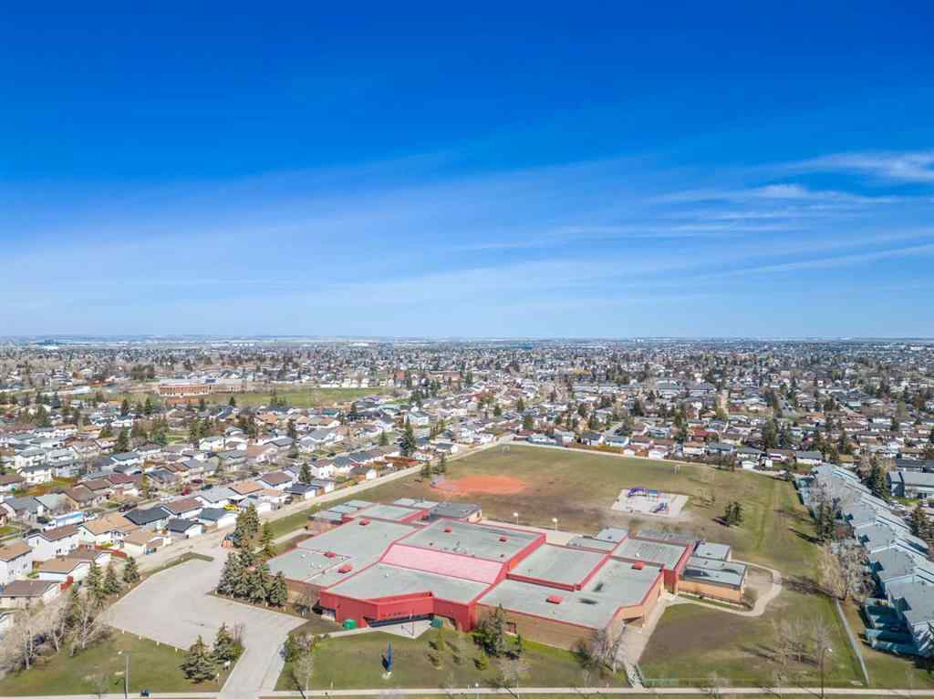 MLS® A2236752 - 67 Fallswater Road NE in Falconridge Calgary, Residential