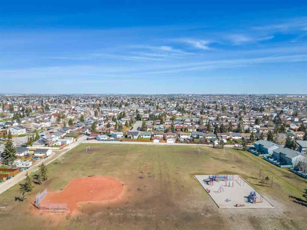 MLS® A2236752 - 67 Fallswater Road NE in Falconridge Calgary, Residential