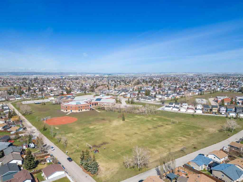 MLS® A2236752 - 67 Fallswater Road NE in Falconridge Calgary, Residential