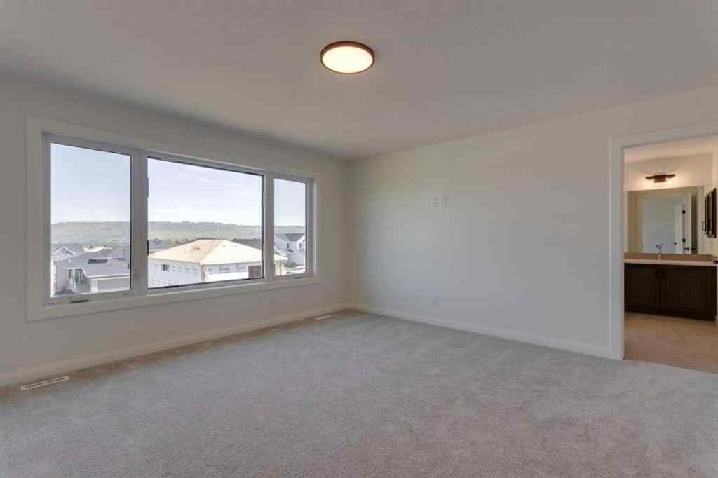 MLS® A2236787 - 275 Rivercrest Boulevard  in Rivercrest Cochrane, Residential