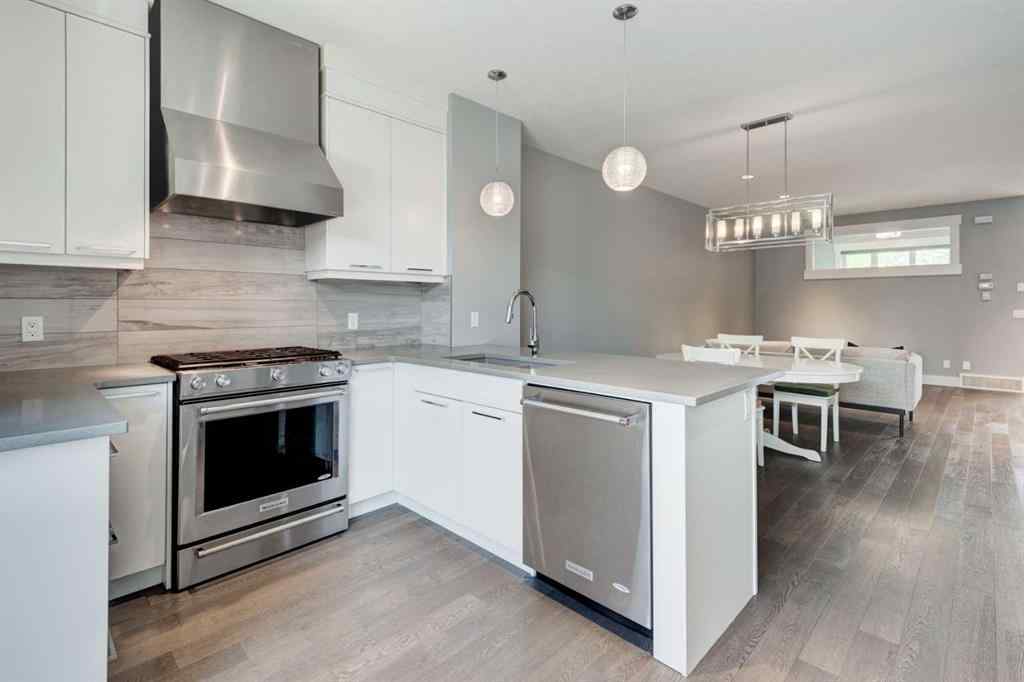 MLS® A2236832 - 112 Burma Star Road SW in Currie Barracks Calgary, Residential