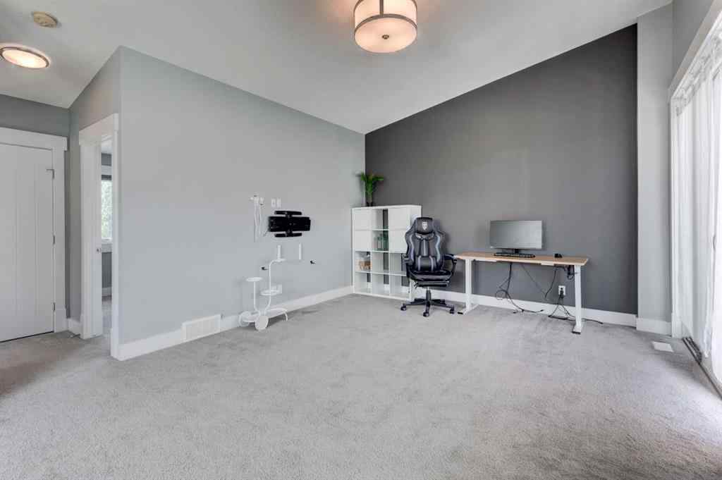 MLS® A2236832 - 112 Burma Star Road SW in Currie Barracks Calgary, Residential