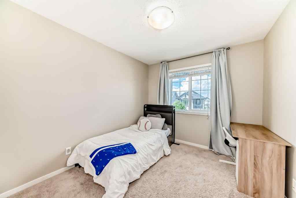MLS® A2236910 - 401 Cranberry Circle SE in Cranston Calgary, Residential