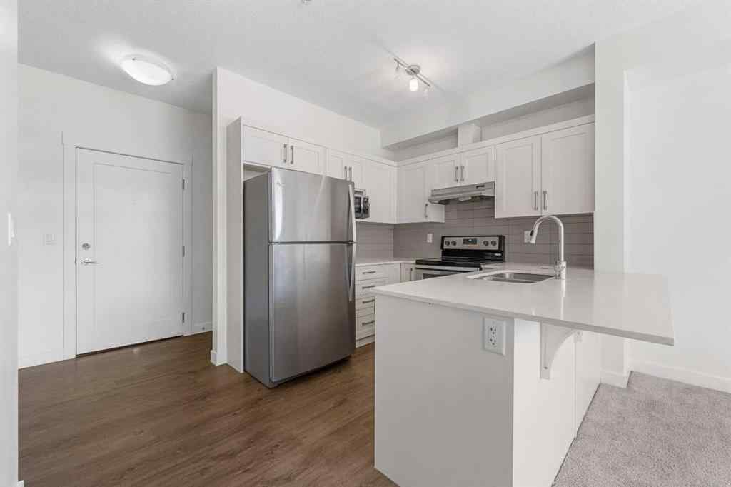 MLS® A2236936 - Unit #211 10 Walgrove Walk SE in Walden Calgary, Residential