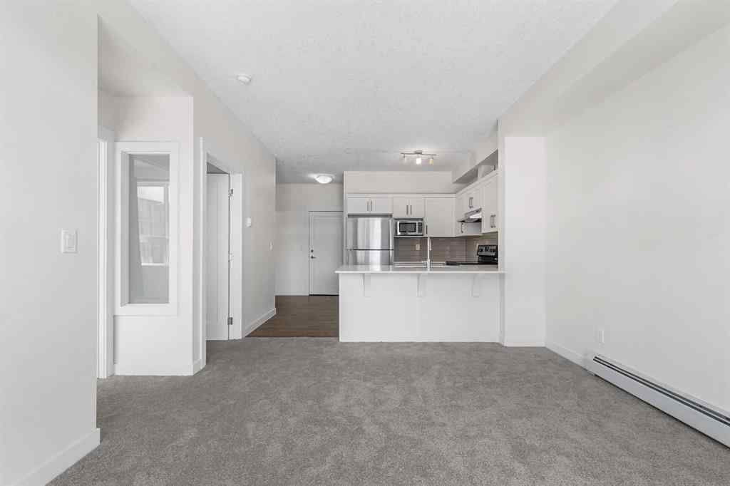 MLS® A2236936 - Unit #211 10 Walgrove Walk SE in Walden Calgary, Residential