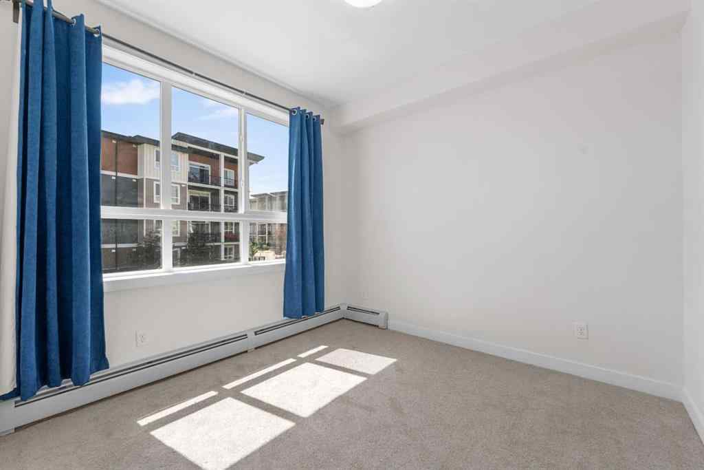 MLS® A2236936 - Unit #211 10 Walgrove Walk SE in Walden Calgary, Residential