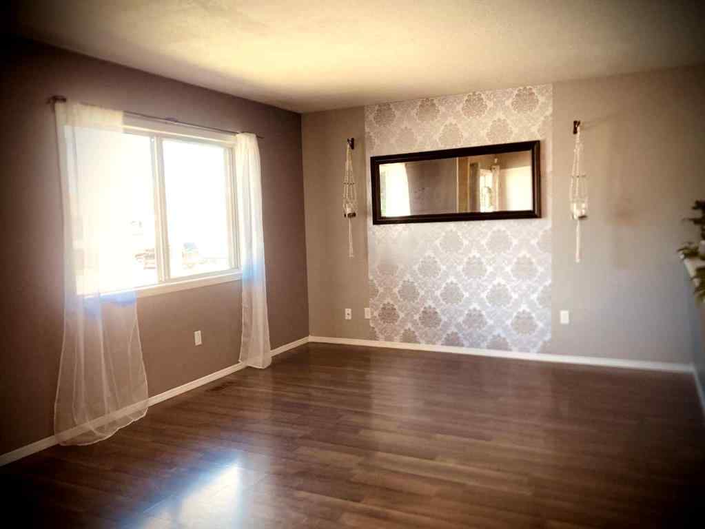 MLS® A2236989 - 4417B 47A Avenue  in Downtown Sylvan Lake, Residential