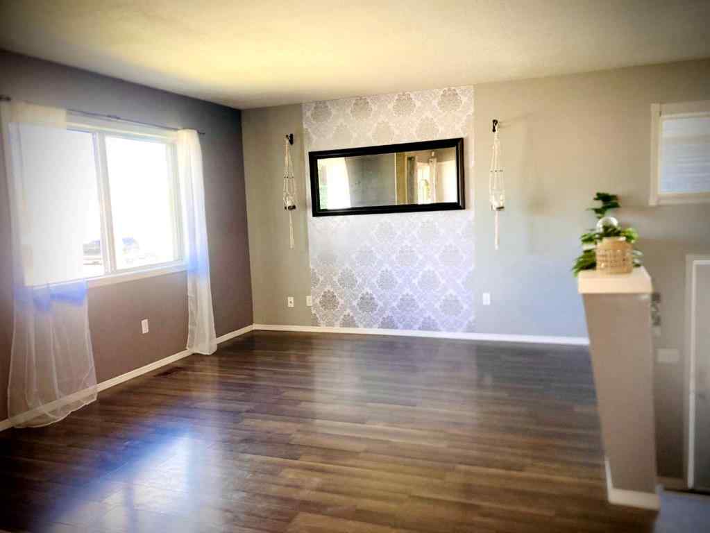 MLS® A2236989 - 4417B 47A Avenue  in Downtown Sylvan Lake, Residential