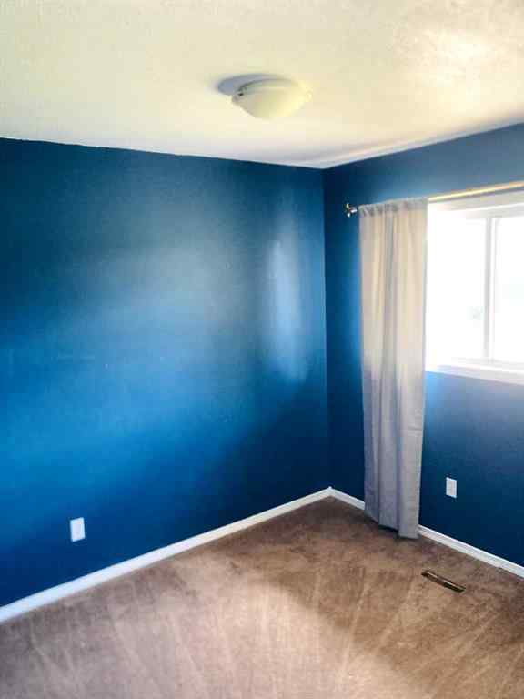 MLS® A2236989 - 4417B 47A Avenue  in Downtown Sylvan Lake, Residential