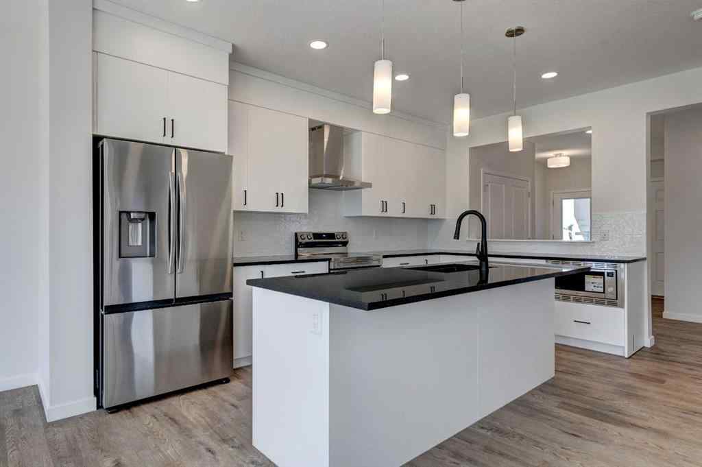 MLS® A2237057 - 77 Silver Spruce Court SW in Silverado Calgary, Residential
