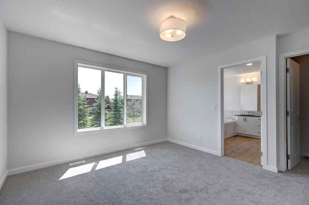 MLS® A2237057 - 77 Silver Spruce Court SW in Silverado Calgary, Residential