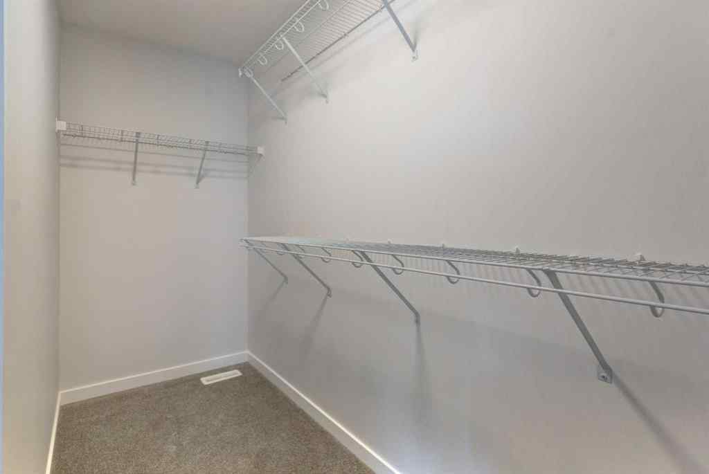 MLS® A2237057 - 77 Silver Spruce Court SW in Silverado Calgary, Residential