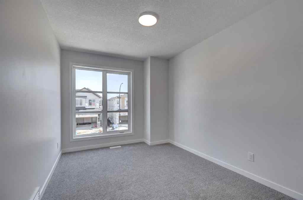 MLS® A2237059 - 232 Creekstone Circle SW in Pine Creek Calgary, Residential