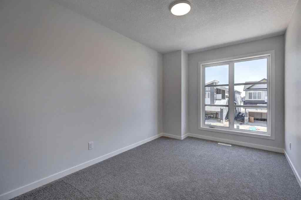 MLS® A2237059 - 232 Creekstone Circle SW in Pine Creek Calgary, Residential