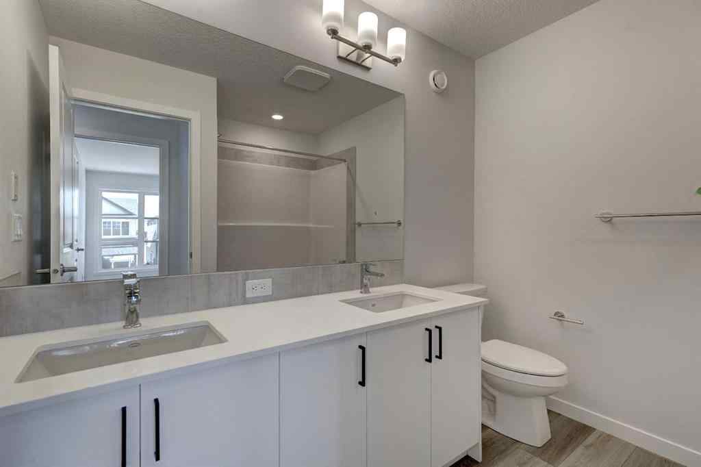 MLS® A2237059 - 232 Creekstone Circle SW in Pine Creek Calgary, Residential