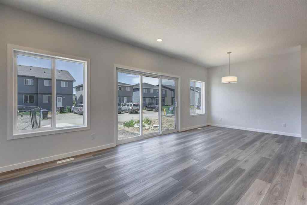MLS® A2237059 - 232 Creekstone Circle SW in Pine Creek Calgary, Residential