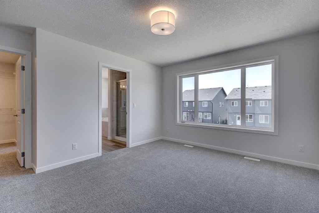 MLS® A2237059 - 232 Creekstone Circle SW in Pine Creek Calgary, Residential