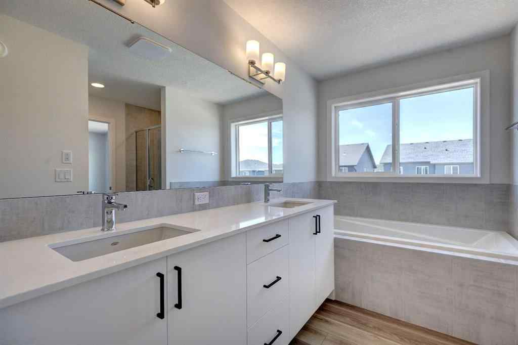MLS® A2237059 - 232 Creekstone Circle SW in Pine Creek Calgary, Residential