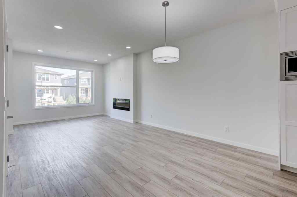 MLS® A2237061 - 116 Herron Walk NE in Livingston Calgary, Residential