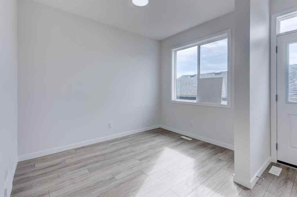 MLS® A2237061 - 116 Herron Walk NE in Livingston Calgary, Residential