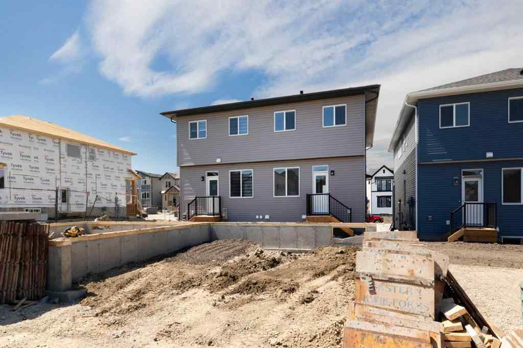 MLS® A2237063 - 905 Livingston View NE in Livingston Calgary, Residential