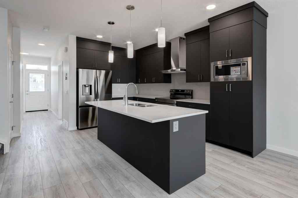 MLS® A2237063 - 905 Livingston View NE in Livingston Calgary, Residential
