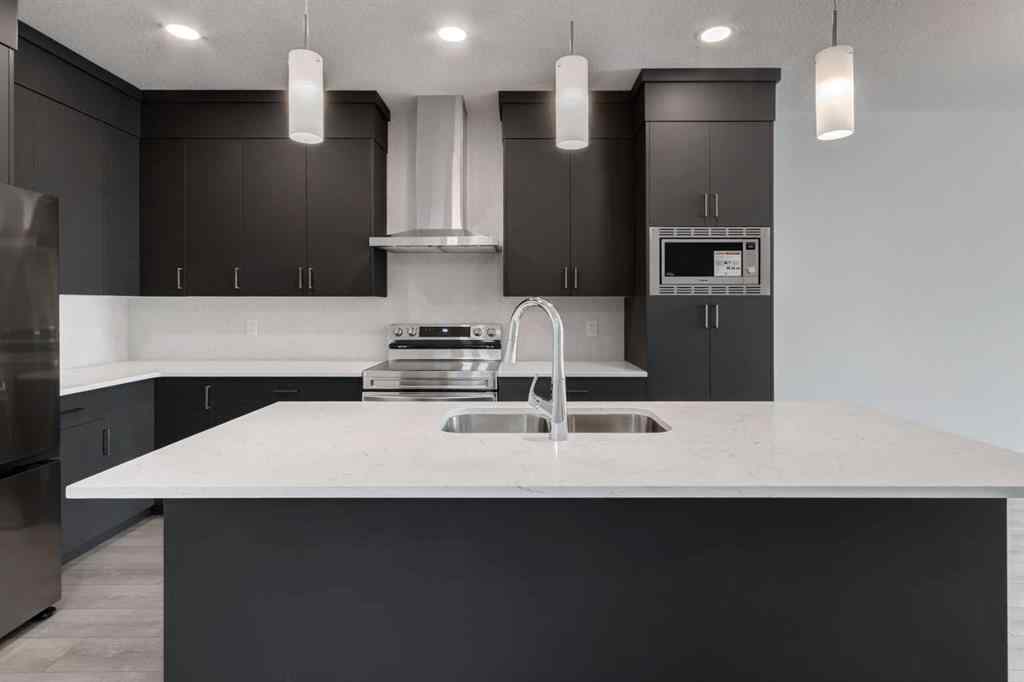 MLS® A2237063 - 905 Livingston View NE in Livingston Calgary, Residential
