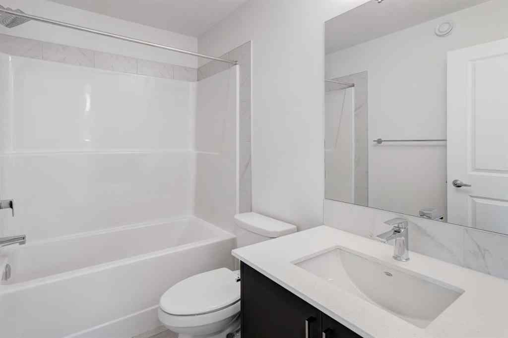 MLS® A2237063 - 905 Livingston View NE in Livingston Calgary, Residential