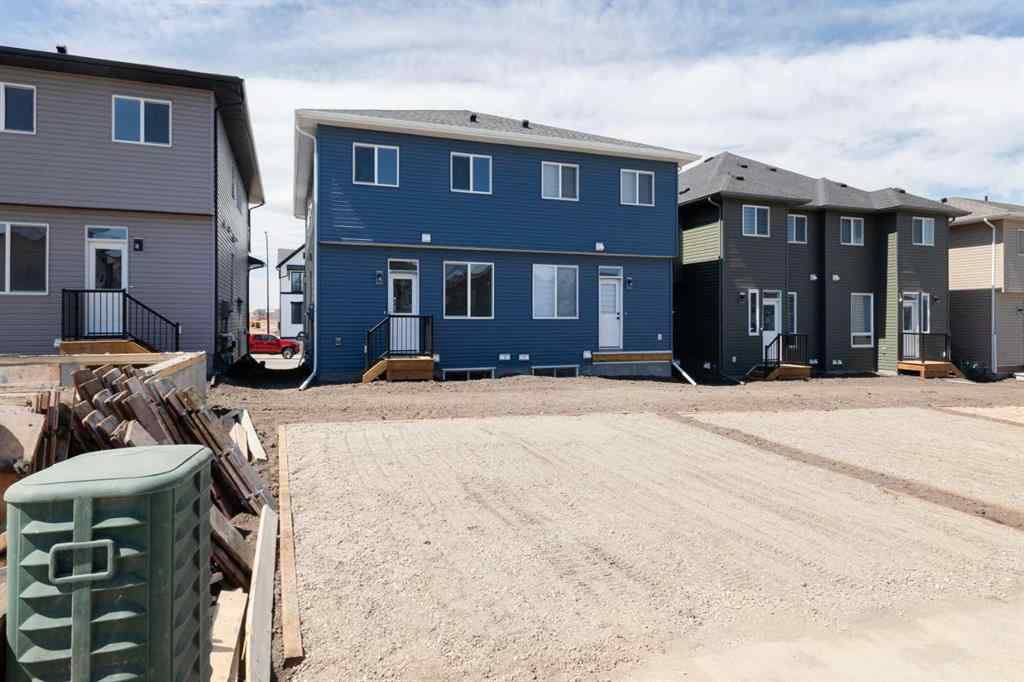 MLS® A2237065 - 909 Livingston View NE in Livingston Calgary, Residential