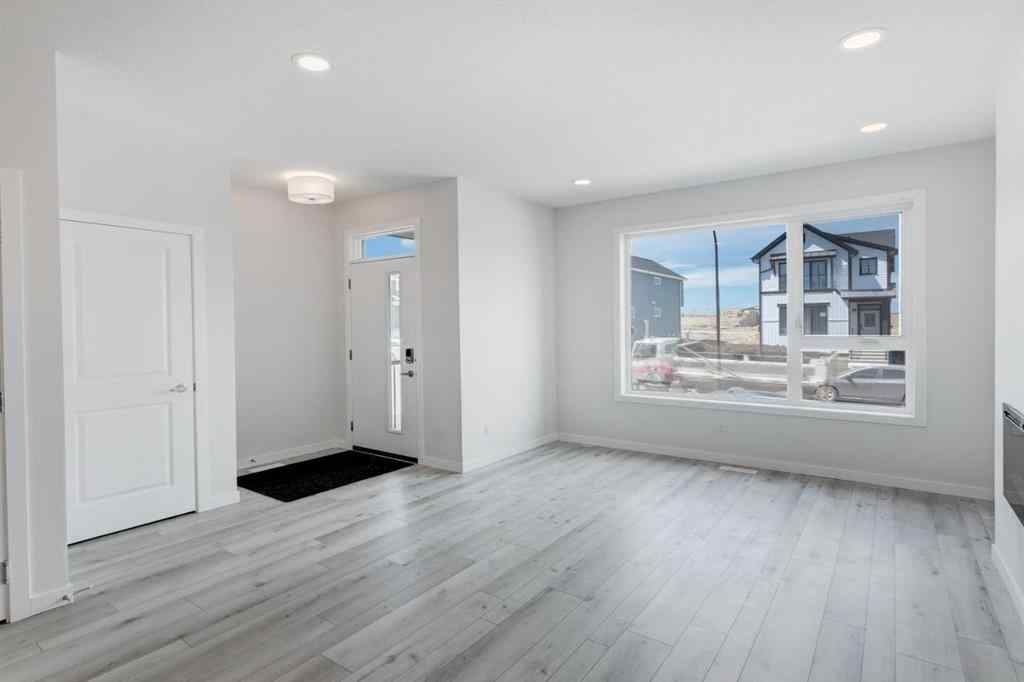 MLS® A2237065 - 909 Livingston View NE in Livingston Calgary, Residential