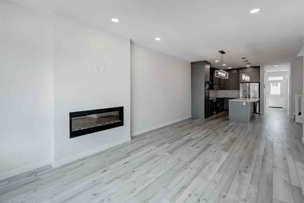 MLS® A2237065 - 909 Livingston View NE in Livingston Calgary, Residential