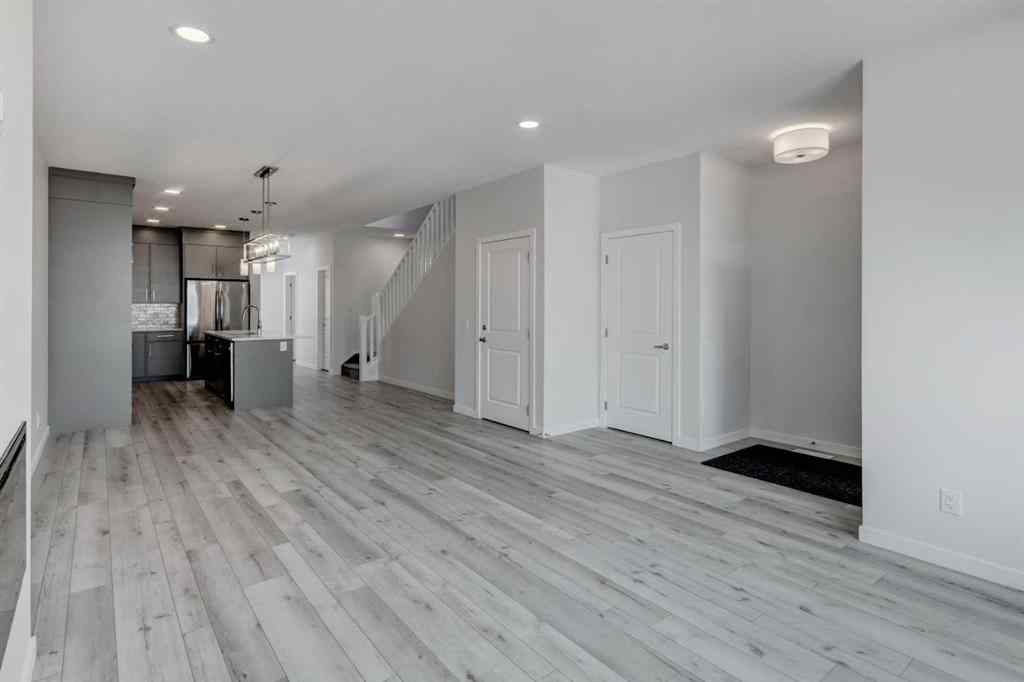 MLS® A2237065 - 909 Livingston View NE in Livingston Calgary, Residential