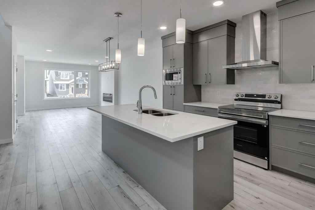 MLS® A2237065 - 909 Livingston View NE in Livingston Calgary, Residential