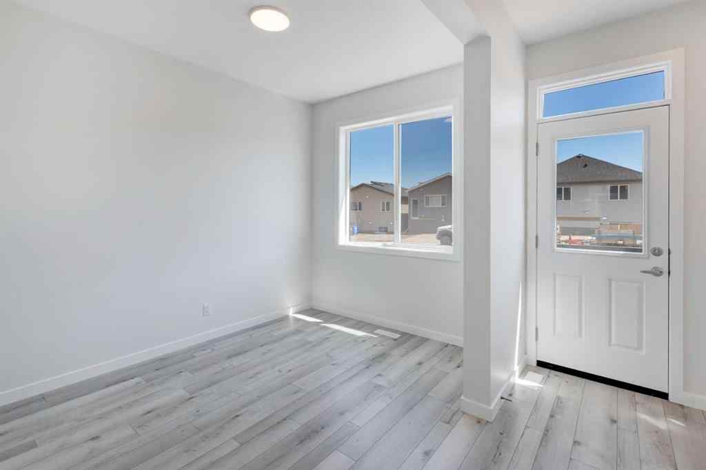 MLS® A2237065 - 909 Livingston View NE in Livingston Calgary, Residential