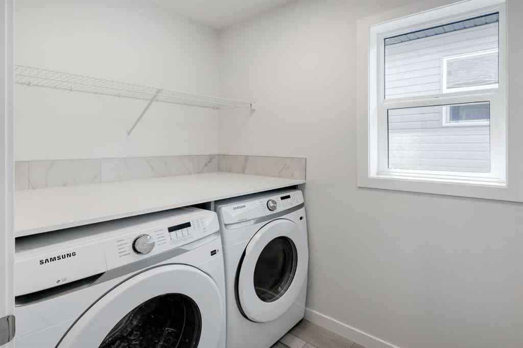 MLS® A2237065 - 909 Livingston View NE in Livingston Calgary, Residential