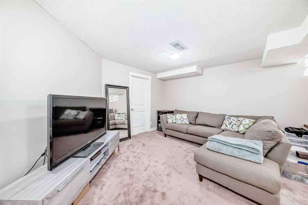MLS® A2237084 - 60 Sunlake Road SE in Sundance Calgary, Residential