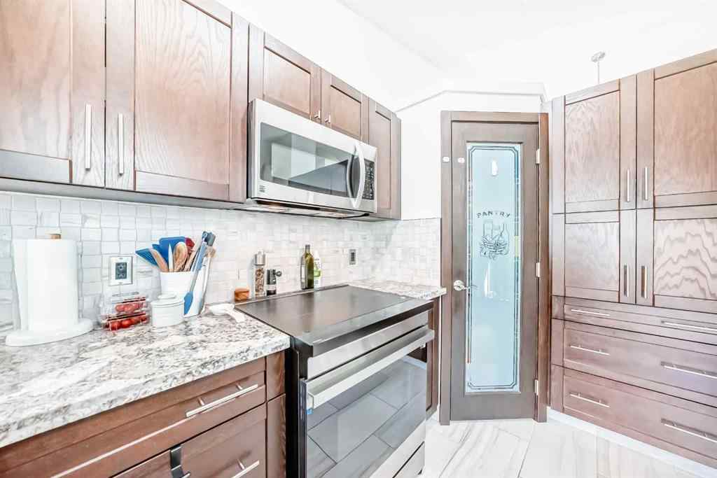 MLS® A2237084 - 60 Sunlake Road SE in Sundance Calgary, Residential
