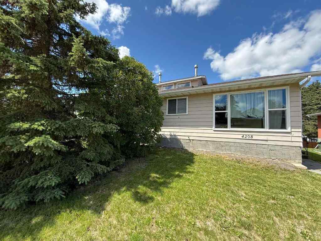 MLS® A2237092 - 4206, 4208 44 Street   in Riverside Ponoka, Residential