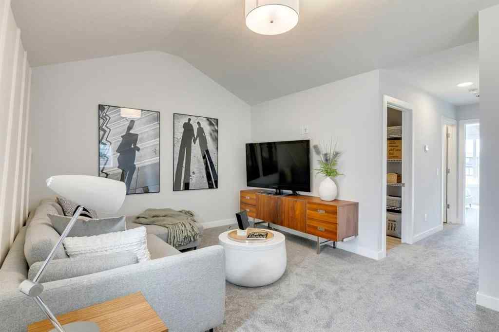 MLS® A2237096 - 306 Hotchkiss Manor SE in Hotchkiss Calgary, Residential