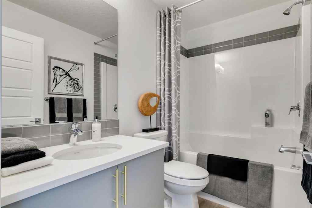 MLS® A2237096 - 306 Hotchkiss Manor SE in Hotchkiss Calgary, Residential