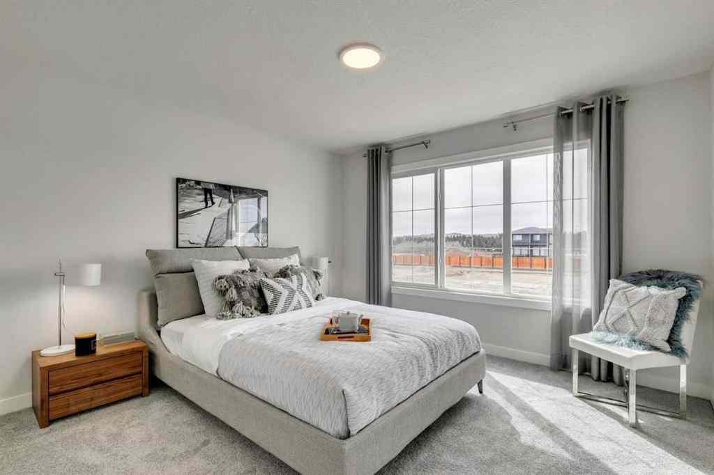 MLS® A2237096 - 306 Hotchkiss Manor SE in Hotchkiss Calgary, Residential