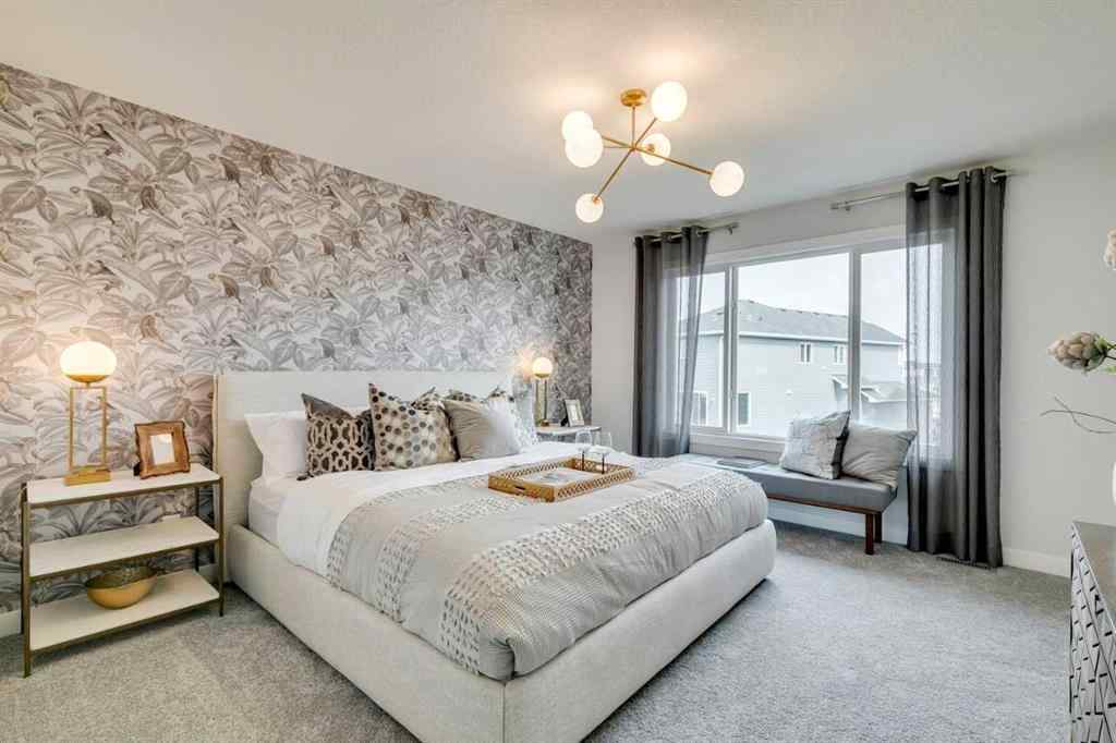 MLS® A2237096 - 306 Hotchkiss Manor SE in Hotchkiss Calgary, Residential