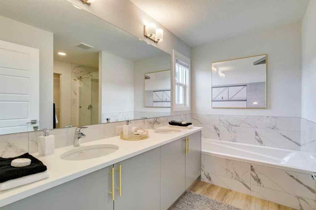 MLS® A2237096 - 306 Hotchkiss Manor SE in Hotchkiss Calgary, Residential