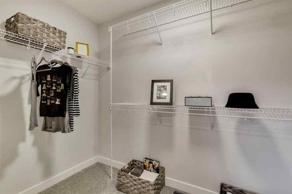 MLS® A2237096 - 306 Hotchkiss Manor SE in Hotchkiss Calgary, Residential