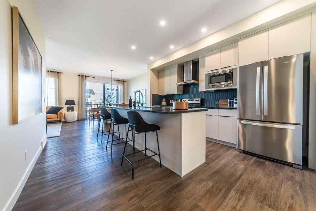 MLS® A2237133 - 405 Sora Way SE in Hotchkiss Calgary, Residential