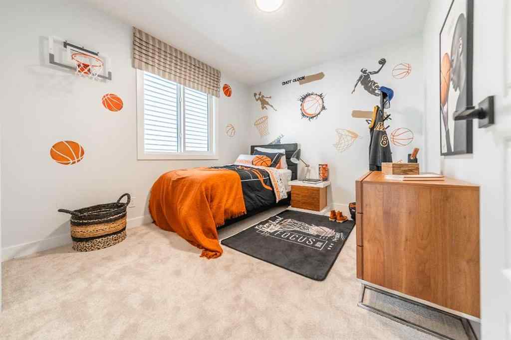 MLS® A2237133 - 405 Sora Way SE in Hotchkiss Calgary, Residential